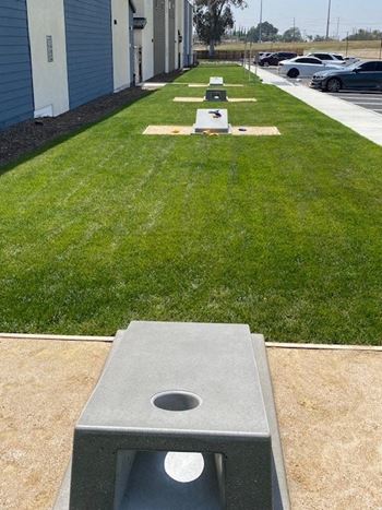a row of ping pong tables in the grassat Westbury Apartments, Rancho Cucamonga, CA, 91739